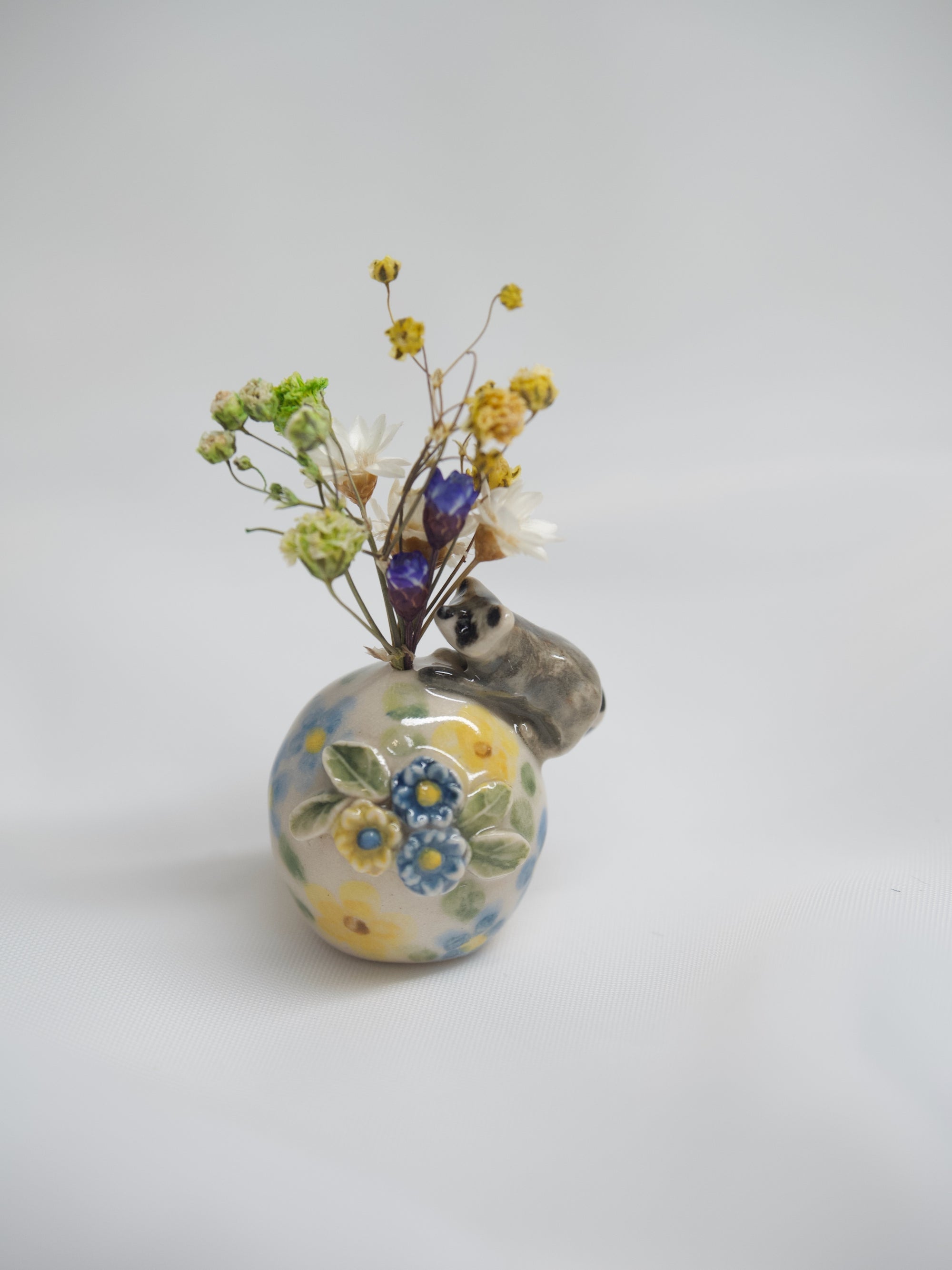 Smaller Raccoon Egg (with dried flowers)