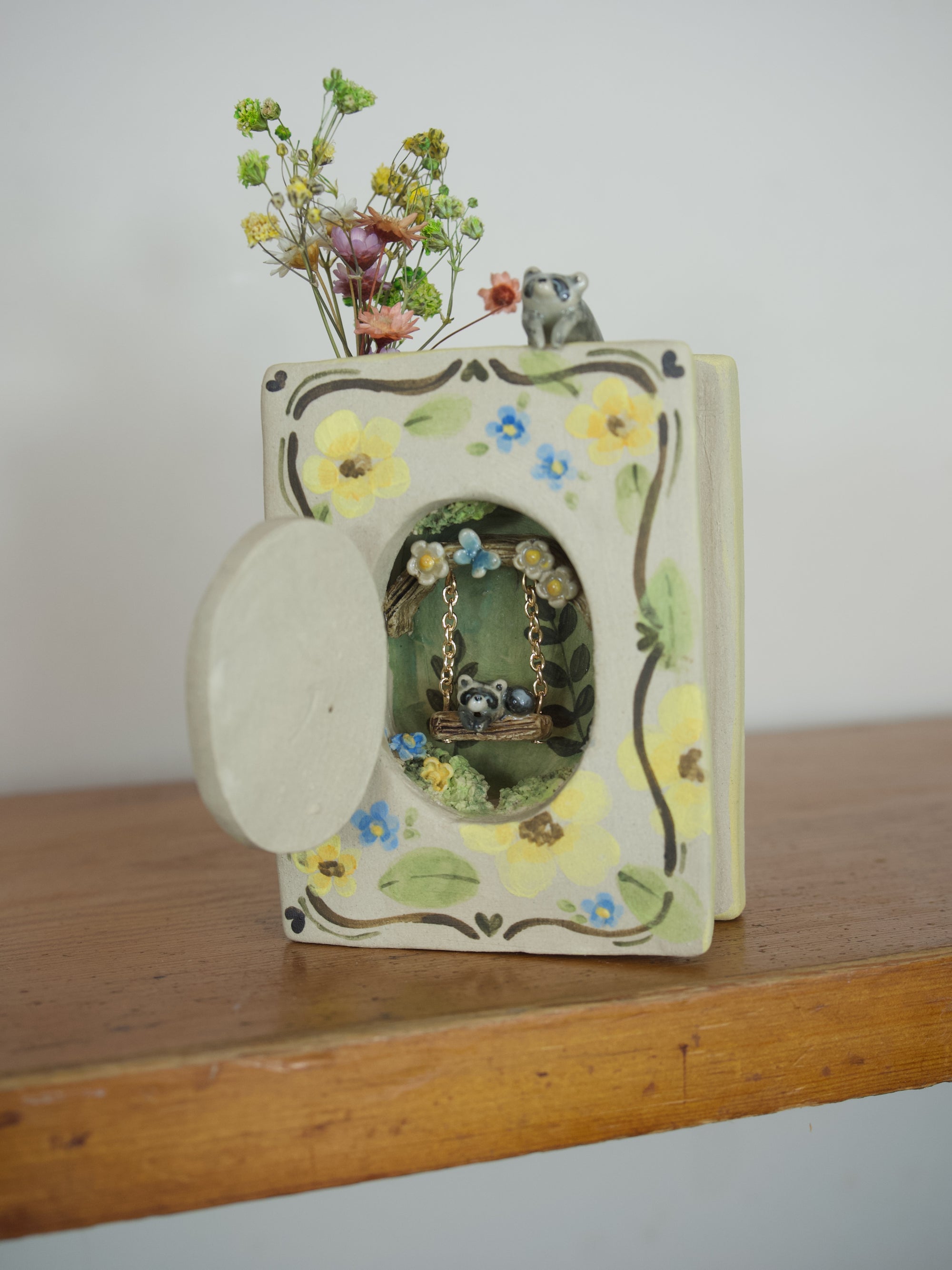 Hidden Swing Floral Garden Raccoon Book ( To hold dried flowers/buds)