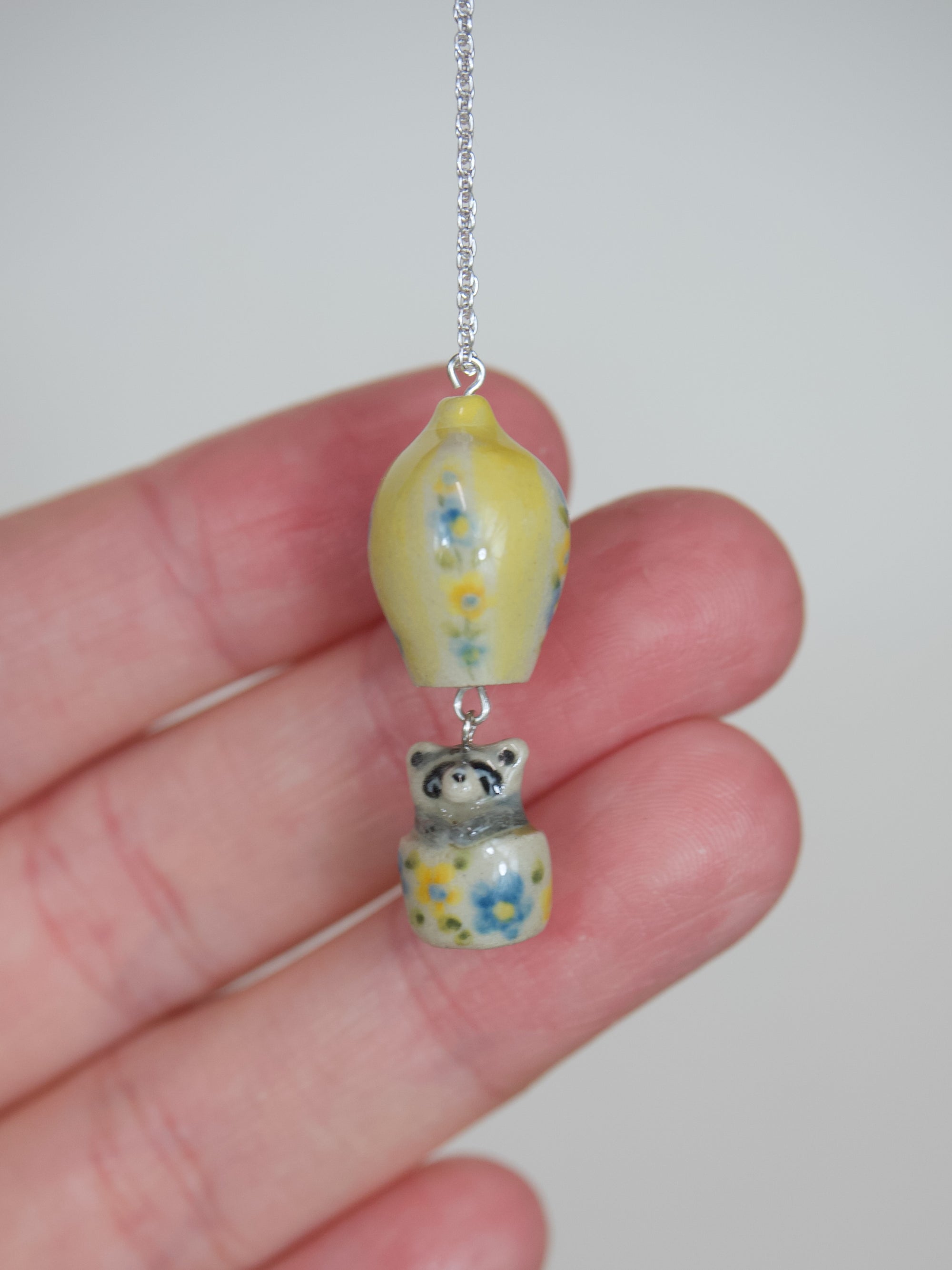 Made To Order: Hot Air Balloon Raccoon Necklace (on or before 15th August Dispatch)