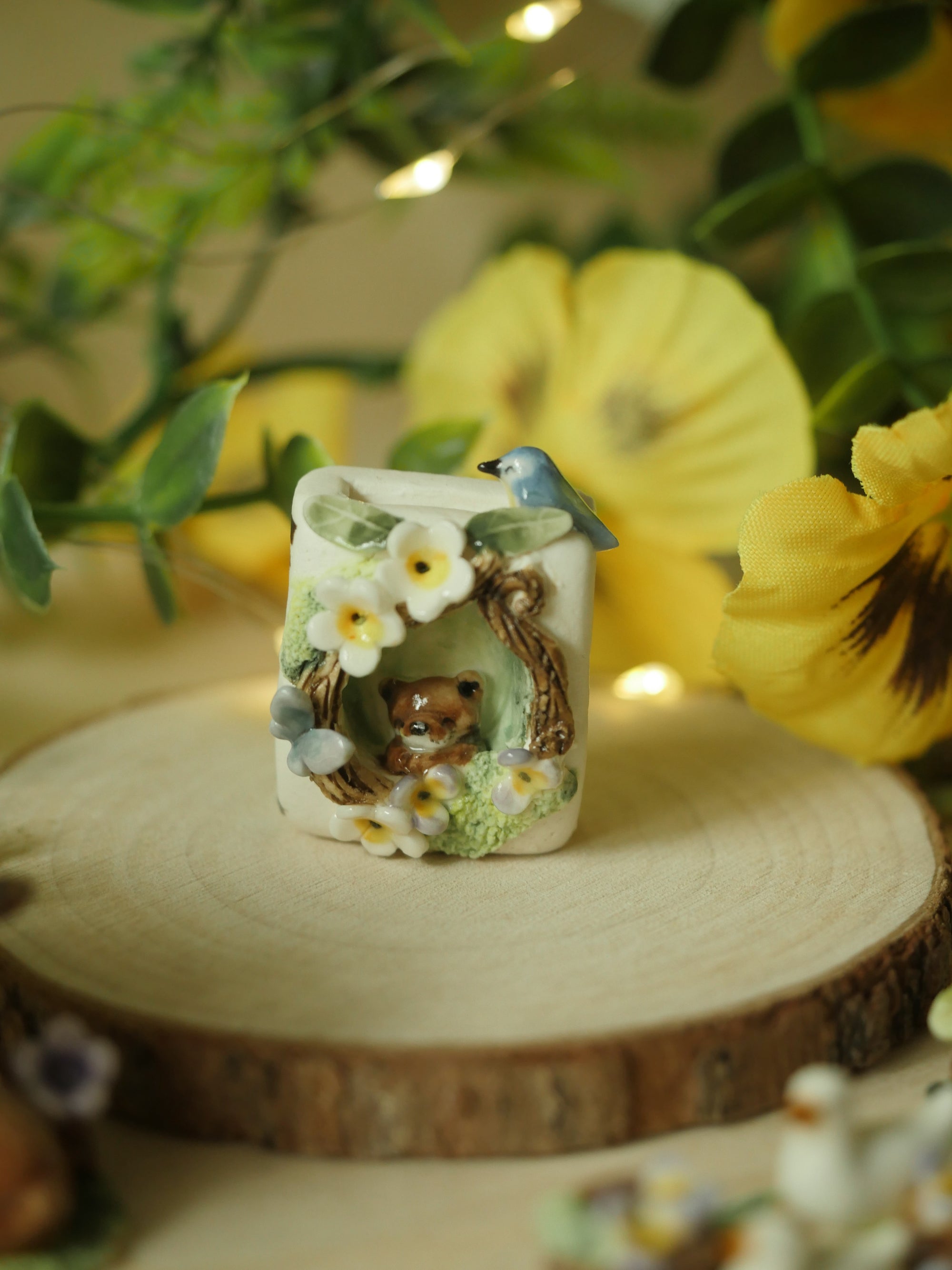 Otter and bird Porcelain Book Sculpture (4cm Height x 3cm Width)