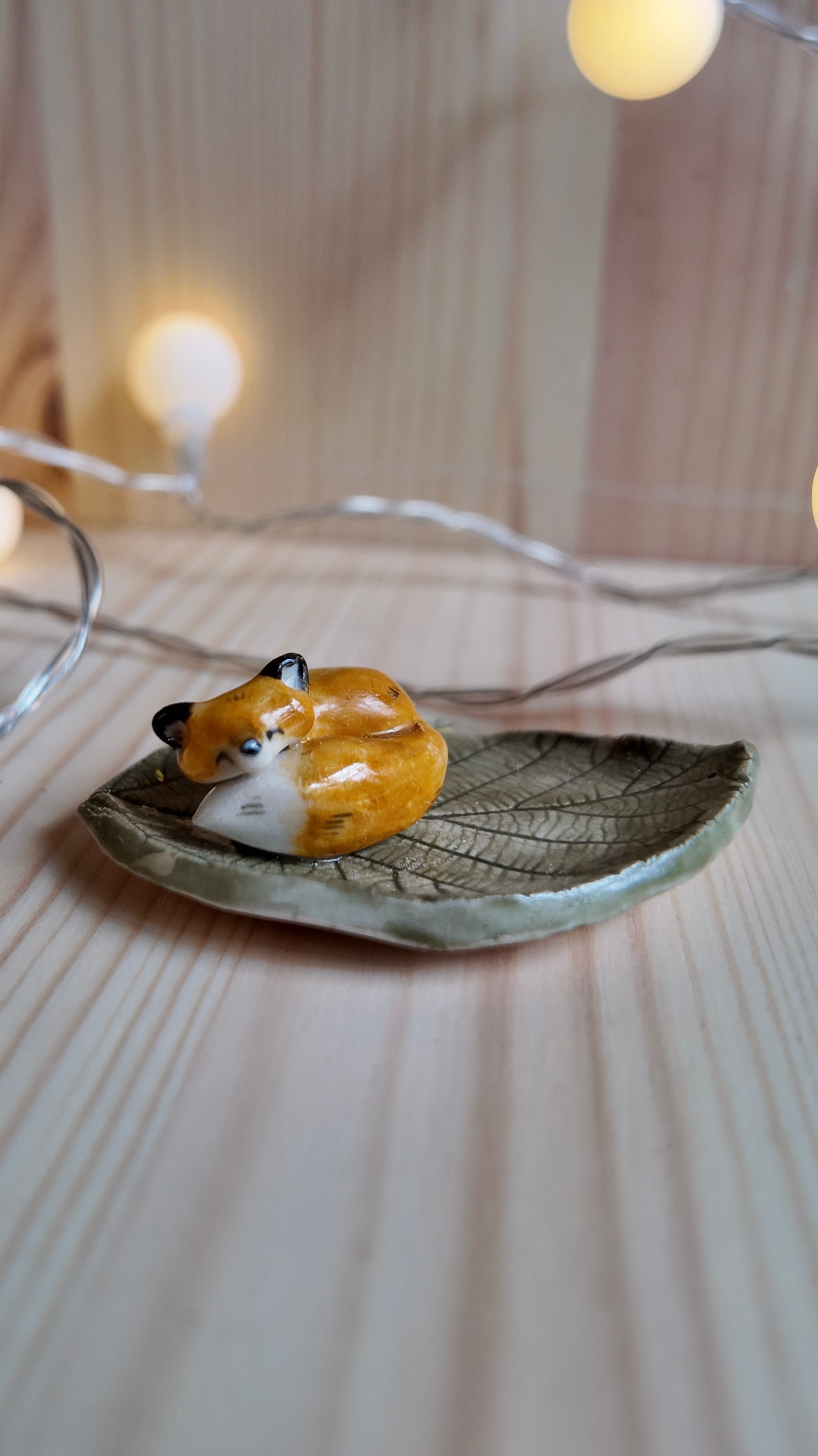 Fox laying small ring dish